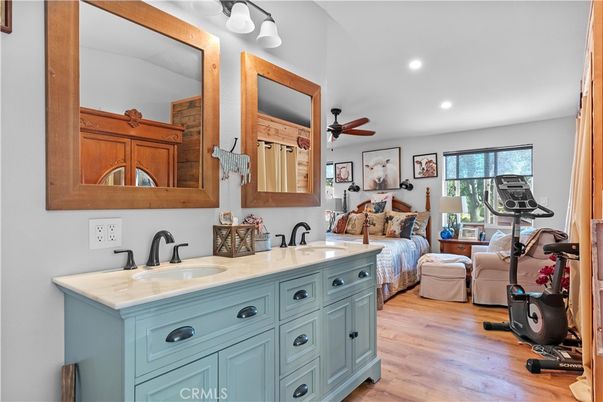 Bathroom, Dual Sink Vanities, Fitness Equipment, Interior, Recessed Lighting, Wood Texture Flooring
