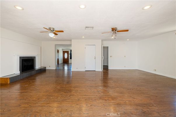 Empty room, Fireplace, Interior, Recessed Lighting, Wood Texture Flooring