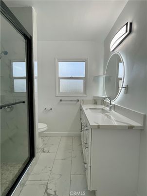 Bathroom, Dual Sink Vanities, Glass Shower, Interior, Marble, Marble Walls