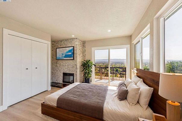 Bedroom, Fireplace, Interior, Recessed Lighting, Stone Walls, Wood Texture Flooring