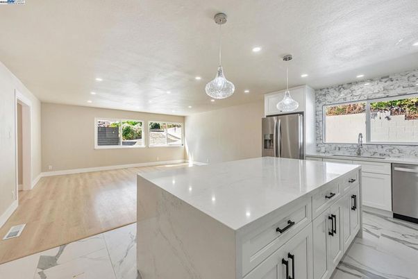 Interior, Kitchen, Marble, Pendant Lights, Recessed Lighting, Stainless Steel Appliances, Wood Texture Flooring