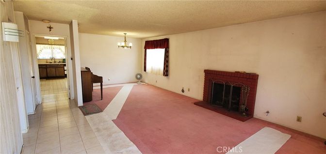 Chandelier, Empty room, Fireplace, Interior