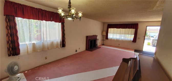 Chandelier, Empty room, Fireplace, Interior