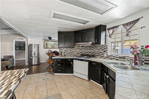 Interior, Kitchen, Tile Countertops, Wood Texture Flooring
