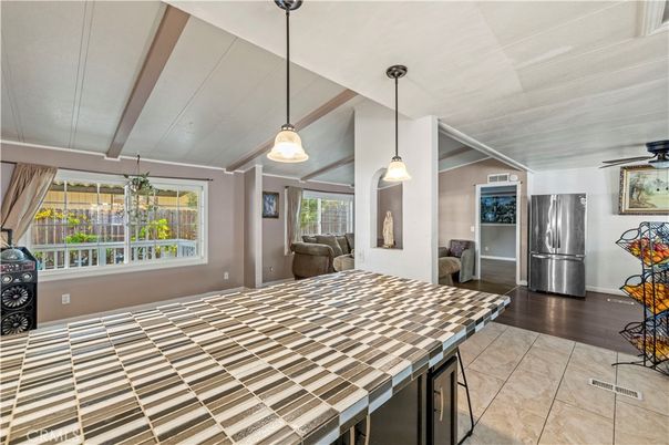 Interior, Kitchen, Pendant Lights, Tile Countertops, Wood Texture Flooring