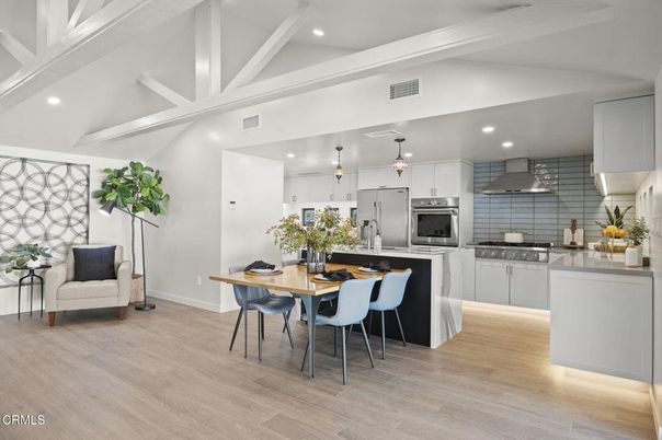 Dining room, Interior, Kitchen, Pendant Lights, Recessed Lighting, Stainless Steel Appliances, Wood Texture Flooring