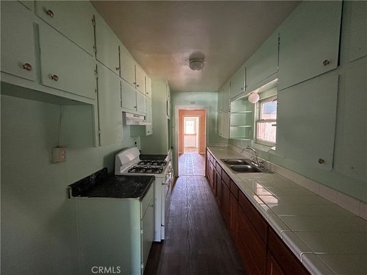 Interior, Kitchen, Tile Countertops, Wood Texture Flooring