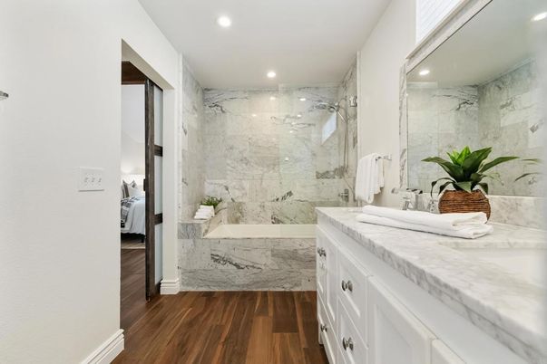 Bathroom, Glass Shower, Interior, Marble Walls, Recessed Lighting, Wood Texture Flooring