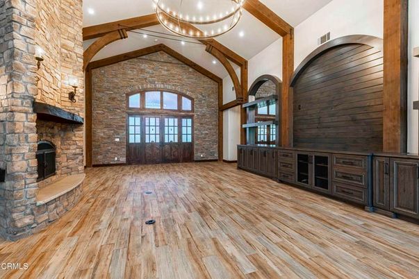Fireplace, Interior, Pendant Lights, Recessed Lighting, Stone Walls, Wooden Beams, Wood Texture Flooring