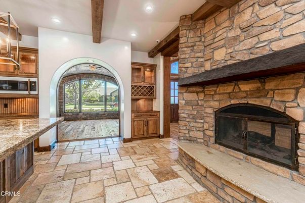 Fireplace, Interior, Recessed Lighting, Stone Walls, Wooden Beams