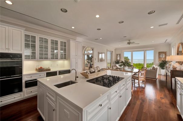 Dining room, Interior, Kitchen, Living room, Recessed Lighting, Water, Wood Texture Flooring