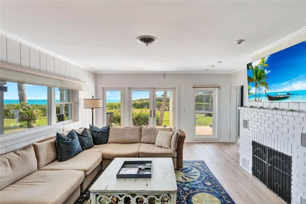 Fireplace, Interior, Living room, Recessed Lighting, Water, Wood Texture Flooring