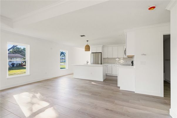 Interior, Kitchen, Pendant Lights, Stainless Steel Appliances, Wood Texture Flooring