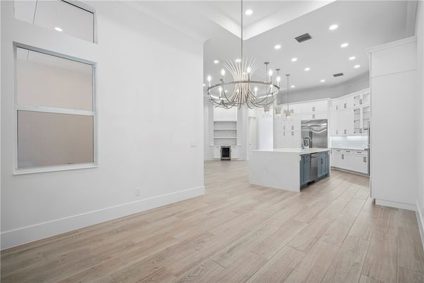Chandelier, Interior, Kitchen, Pendant Lights, Recessed Lighting, Stainless Steel Appliances, Wood Texture Flooring