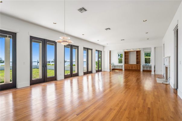 Empty room, Fireplace, Interior, Pendant Lights, Recessed Lighting, Wood Texture Flooring