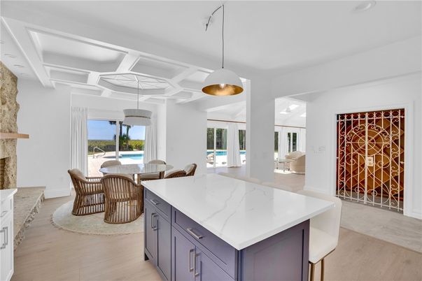 Dining room, Fireplace, Interior, Pendant Lights, Wood Texture Flooring