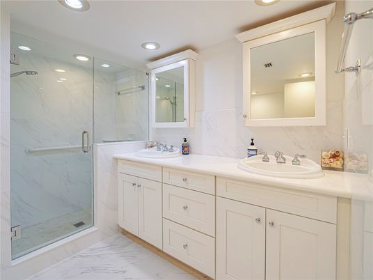Bathroom, Dual Sink Vanities, Glass Shower, Interior, Marble, Marble Walls, Recessed Lighting