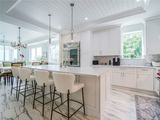 Chandelier, Dining room, Interior, Kitchen, Marble, Pendant Lights, Recessed Lighting, Stainless Steel Appliances