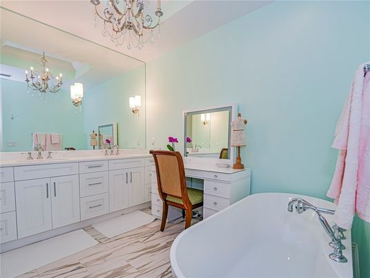 Bathroom, Chandelier, Dual Sink Vanities, Free Standing Baths, Interior, Marble