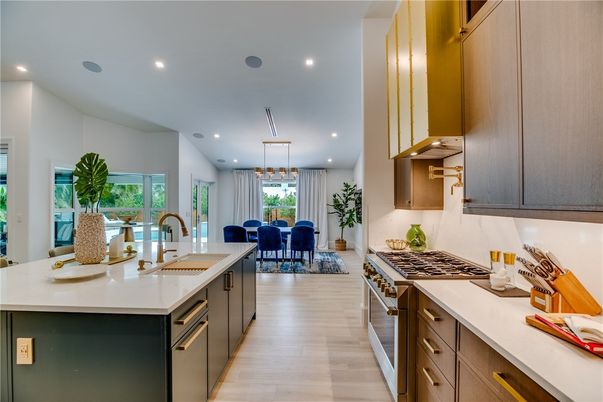 Dining room, Interior, Kitchen, Pendant Lights, Recessed Lighting, Stainless Steel Appliances, Wood Texture Flooring
