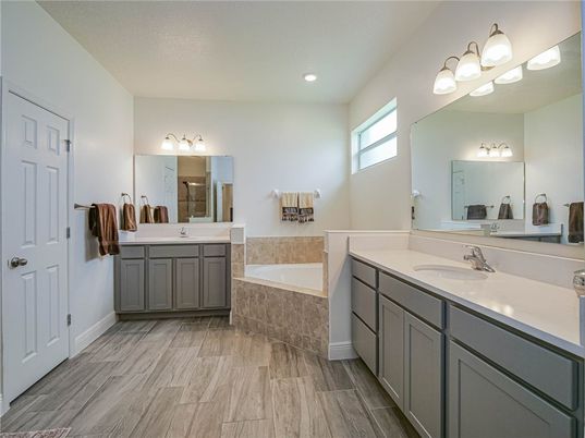Bathroom, Dual Sink Vanities, Interior, Recessed Lighting, Wood Texture Flooring