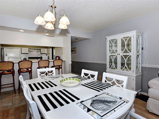 Chandelier, Dining room, Interior, Kitchen, Recessed Lighting, Stainless Steel Appliances, Wood Texture Flooring