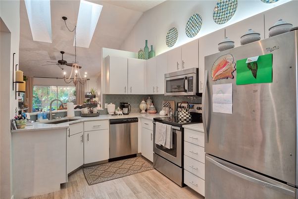 Interior, Kitchen, Pendant Lights, Stainless Steel Appliances, Wood Texture Flooring