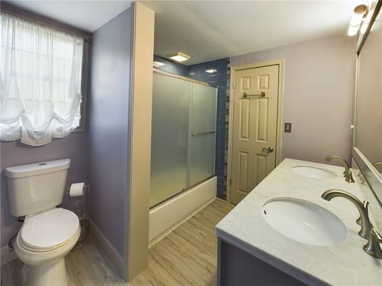Bathroom, Dual Sink Vanities, Glass Shower, Interior, Wood Texture Flooring