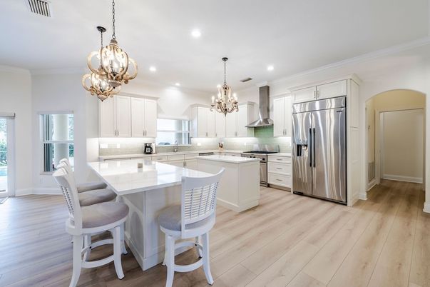 Chandelier, Interior, Kitchen, Pendant Lights, Recessed Lighting, Stainless Steel Appliances, Wood Texture Flooring