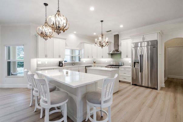 Chandelier, Interior, Kitchen, Pendant Lights, Recessed Lighting, Stainless Steel Appliances, Wood Texture Flooring