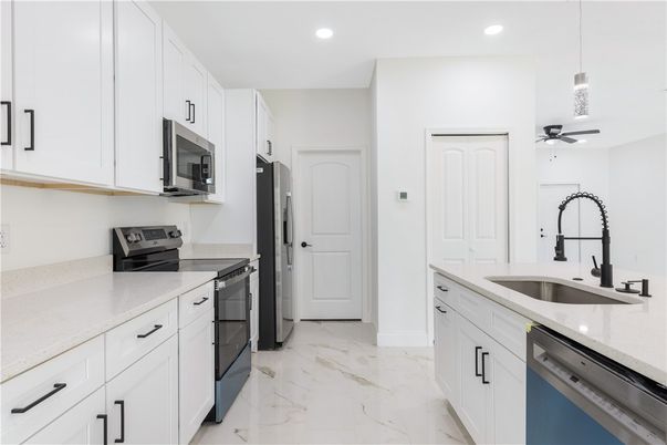 Interior, Kitchen, Marble, Pendant Lights, Recessed Lighting, Stainless Steel Appliances