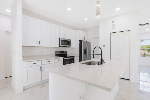 Interior, Kitchen, Marble, Pendant Lights, Recessed Lighting, Stainless Steel Appliances