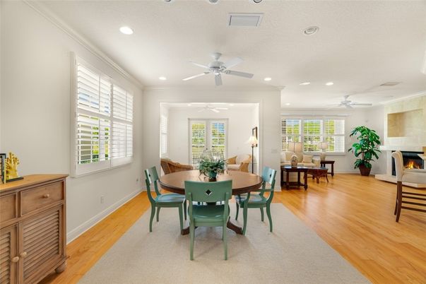 Dining room, Fireplace, Interior, Recessed Lighting, Wood Texture Flooring