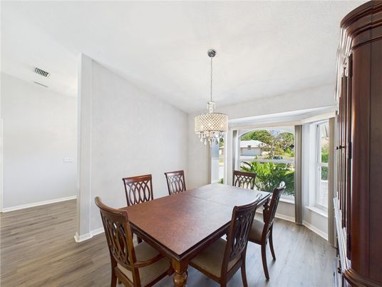 Chandelier, Dining room, Interior, Pendant Lights, Wood Texture Flooring