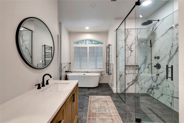 Bathroom, Free Standing Baths, Glass Shower, Interior, Marble Walls, Recessed Lighting
