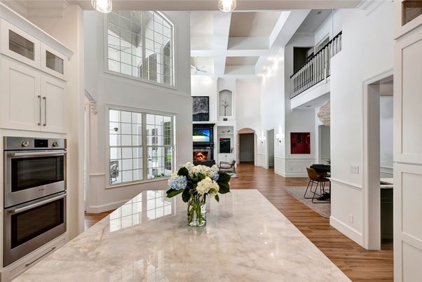 Dining room, Fireplace, Interior, Kitchen, Stainless Steel Appliances, Wood Texture Flooring