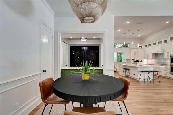 Dining room, Interior, Kitchen, Pendant Lights, Recessed Lighting, Stainless Steel Appliances, Wood Texture Flooring