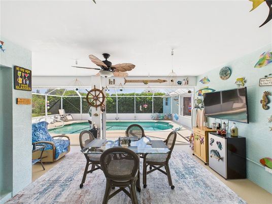 Dining room, Interior, Living room, Pool, Sun Room