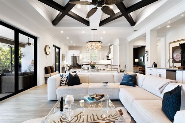Chandelier, Dining room, Interior, Kitchen, Living room, Recessed Lighting, Stainless Steel Appliances, Wooden Beams, Wood Texture Flooring