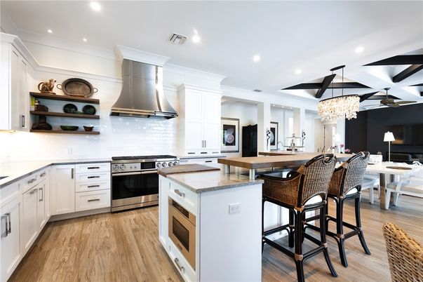 Chandelier, Dining room, Interior, Kitchen, Recessed Lighting, Stainless Steel Appliances, Wood Texture Flooring