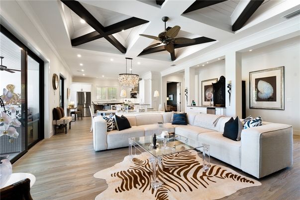 Chandelier, Dining room, Interior, Kitchen, Living room, Pendant Lights, Recessed Lighting, Stainless Steel Appliances, Wood Texture Flooring
