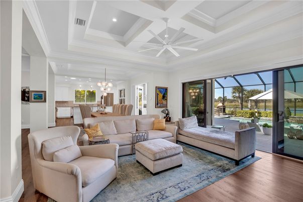 Chandelier, Dining room, Interior, Kitchen, Living room, Recessed Lighting, Wood Texture Flooring