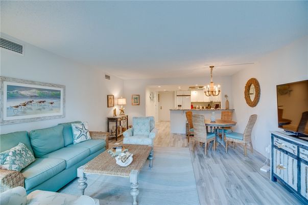 Chandelier, Dining room, Interior, Kitchen, Living room, Pendant Lights, Recessed Lighting, Wood Texture Flooring
