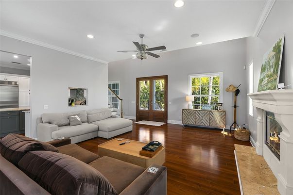 Fireplace, Interior, Kitchen, Living room, Recessed Lighting, Wood Texture Flooring