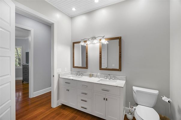 Bathroom, Dual Sink Vanities, Interior, Recessed Lighting, Wood Texture Flooring