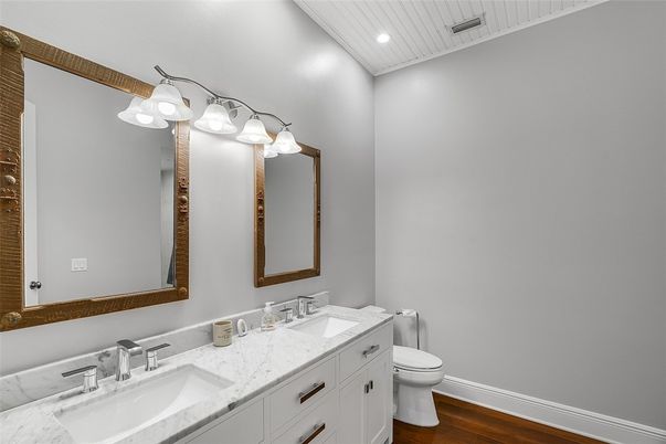 Bathroom, Dual Sink Vanities, Interior, Recessed Lighting, Wood Texture Flooring
