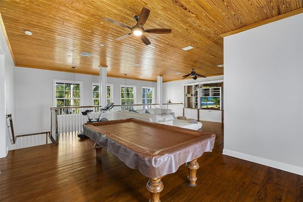 Billiard Table, Fitness Equipment, Game Room, Interior, Living room, Wooden Ceilings, Wood Texture Flooring