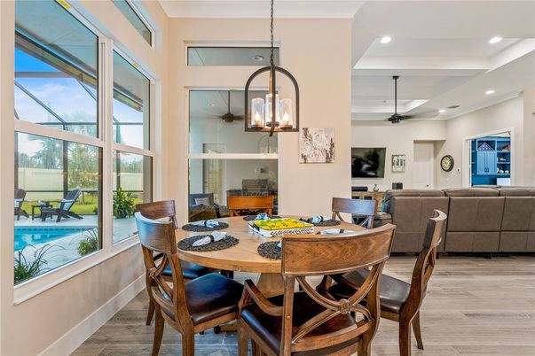 Dining room, Interior, Living room, Pendant Lights, Recessed Lighting, Wood Texture Flooring