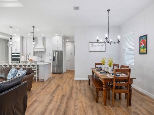Chandelier, Dining room, Interior, Kitchen, Pendant Lights, Recessed Lighting, Stainless Steel Appliances, Wood Texture Flooring