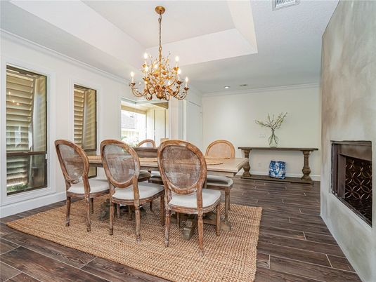 Chandelier, Dining room, Fireplace, Interior, Recessed Lighting, Wood Texture Flooring